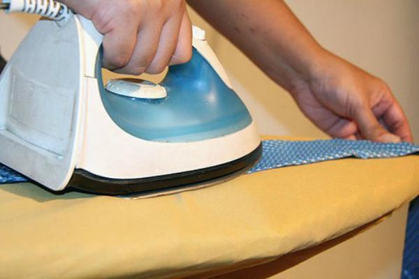 Use a stiff piece of paper to separate the two sides of the bowtie for ironing