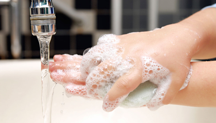 Washing hands before meals removes dirt and harmful bacteria.
