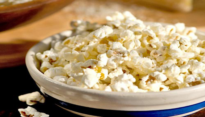Watching a movie while enjoying popcorn also helps you sleep