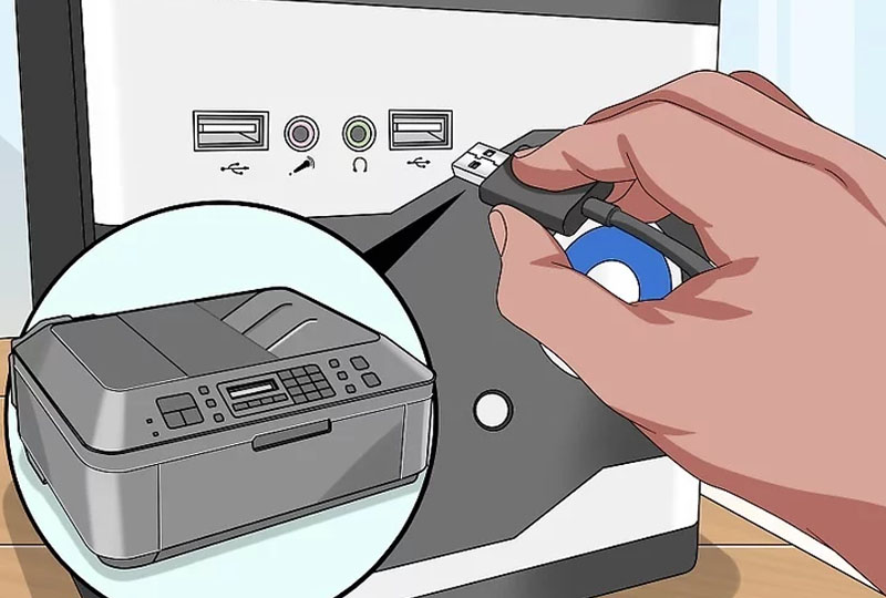 Khi máy tính đã được bật và mở khóa, bạn dùng dây cáp USB để kết nối máy in với máy tính.