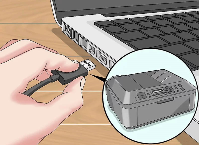  Kết nối máy in với máy tính bằng cách gắn dây cáp USB vào cổng USB trên thân máy tính