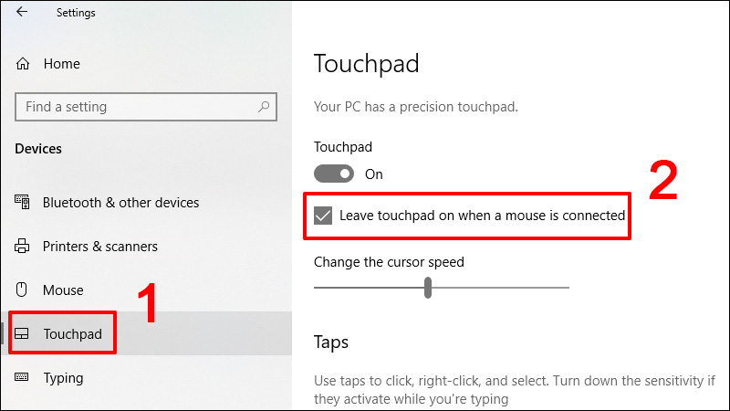 Tick bỏ chọn mục Leave touchpad on when a mouse is connected