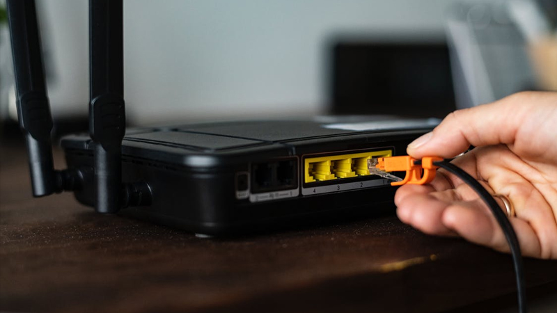 Khởi động lại router WiFi để cải thiện kết nối mạng