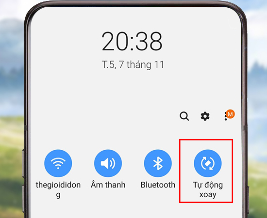 Bước 2: Bấm vào nút Tự động xoay.