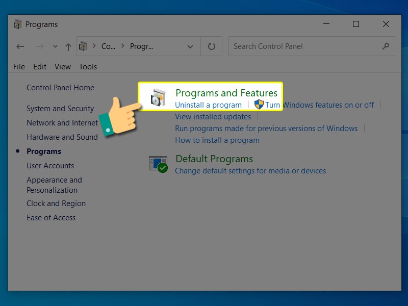 Chọn Programs and Features Chọn Programs and Features