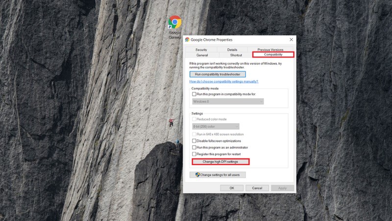 Chọn Change high DPI settings