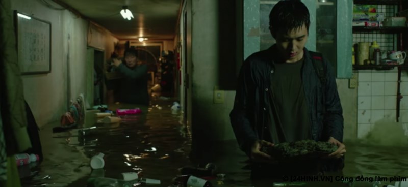 Ki Woo tìm lại hòn đá trong đêm lụt