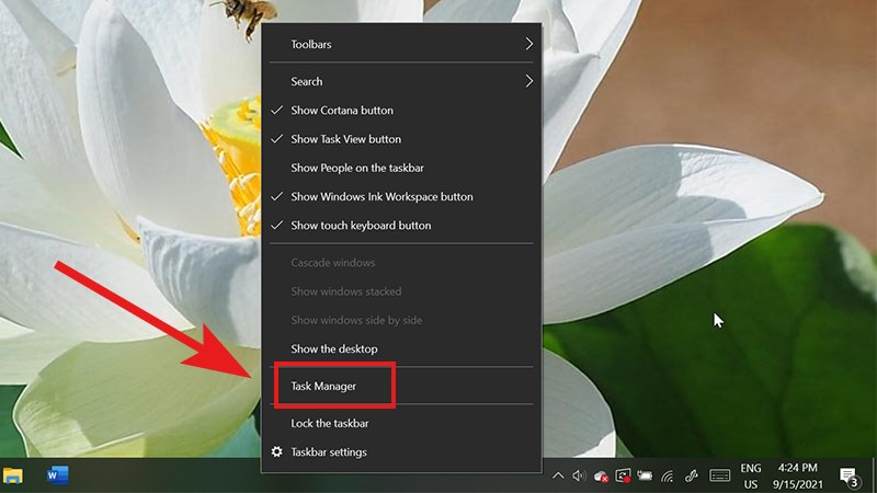 Click chuột phải vào thanh Taskbar và chọn Taskbar Manager