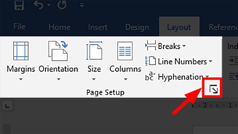 Ở mục Page Setup > Nhấn vào mũi tên chéo xuống