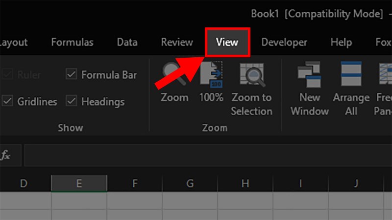 Mở file Excel cần xóa dòng kẻ > Chọn thẻ View
