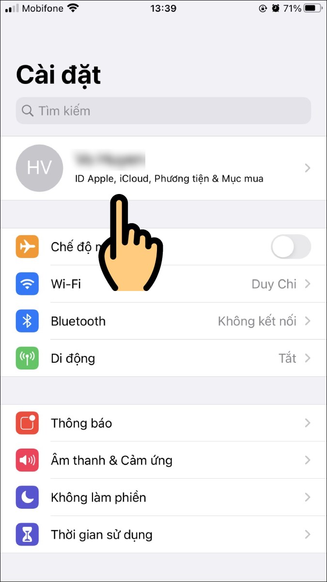 Chọn mục ID Apple, iCloud, Phương tiện & Mục mua