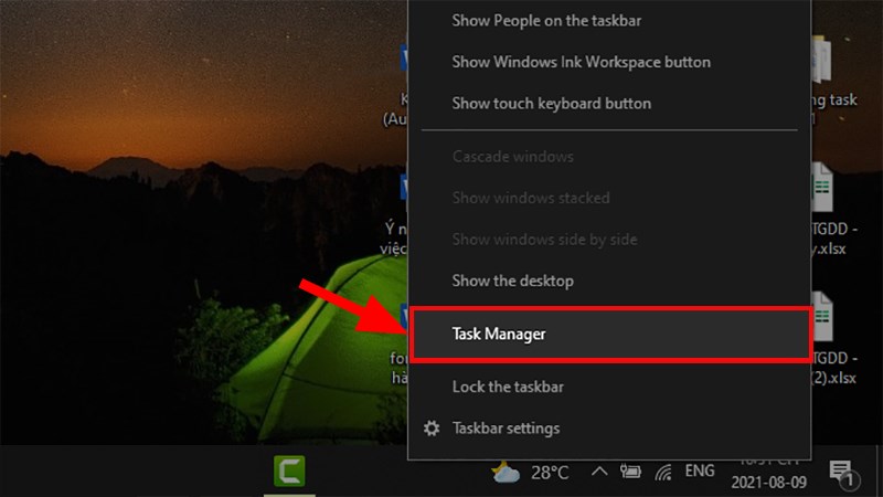 Nhấn chuột phải vào thanh taskbar > Chọn Task Manager