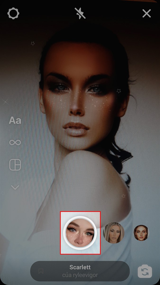 Nhấn giữ biểu tượng để quay video hoặc nhấn v&agrave;o biểu tượng để chụp ảnh