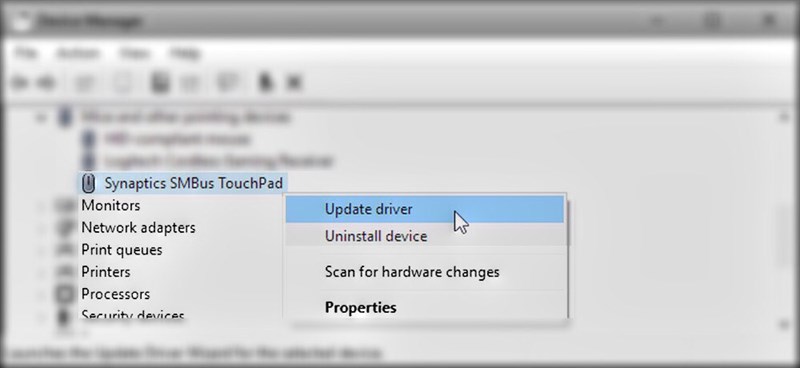 Click chuột phải v&agrave;o phần thiết bị touchpad v&agrave; chọn Update Driver