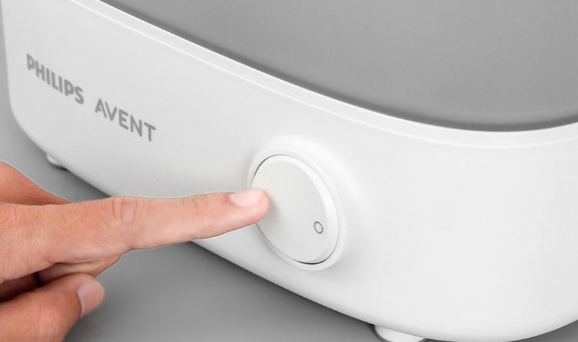 Đậy nắp và khởi động máy