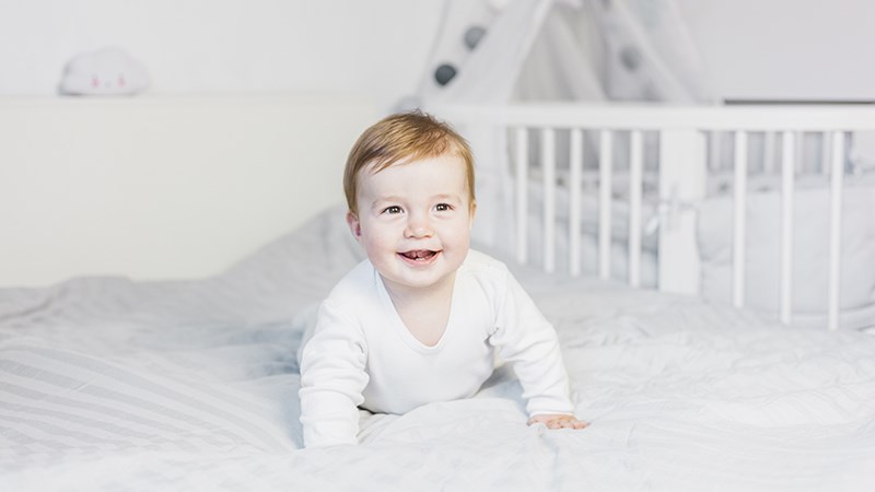 Trẻ bị chậm mọc răng sữa nếu sau 12 tháng tuổi vẫn chưa mọc cái răng đầu tiên. Nguồn: Freepik.