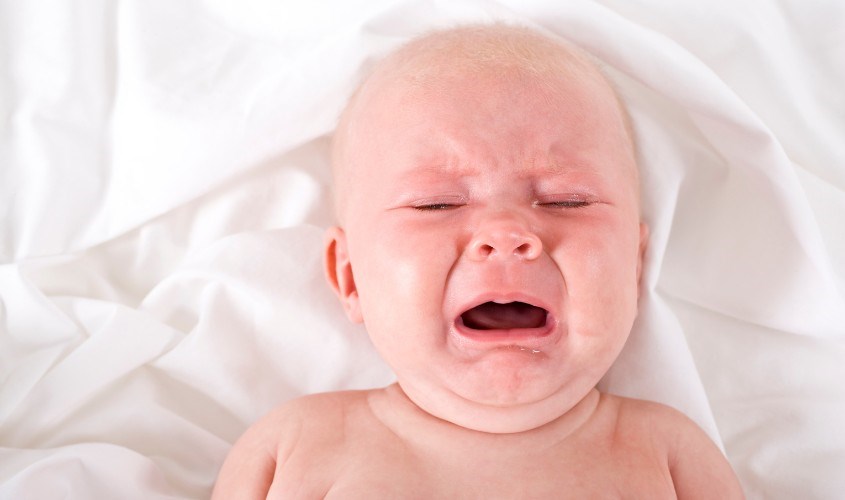 Cáu kỉnh, quấy khóc là một trong các biểu hiện của chứng thiếu kẽm và lysine