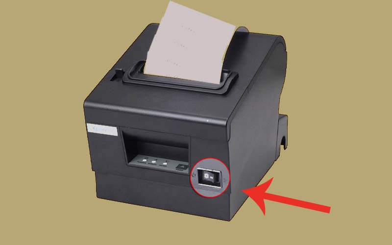 Ấn vào nút nguồn của máy in để khởi động máy