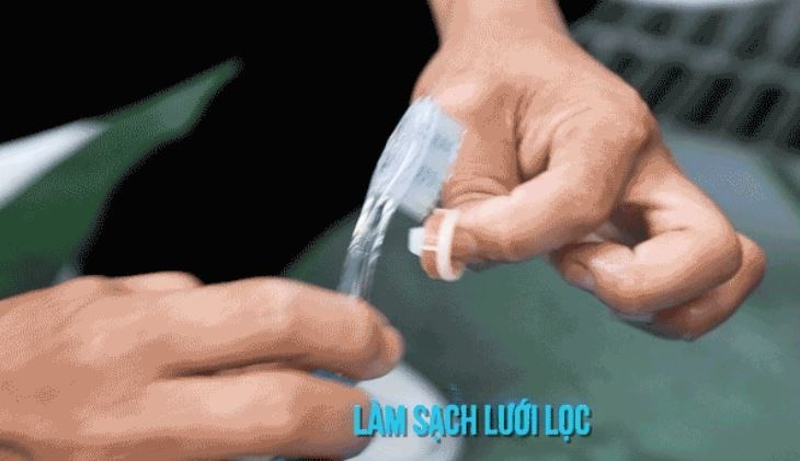 vệ sinh lưới lọc máy giặt