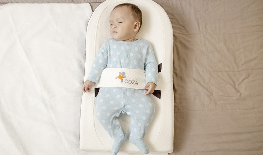 Để bé nằm đúng tư thế Để bé nằm đúng tư thế