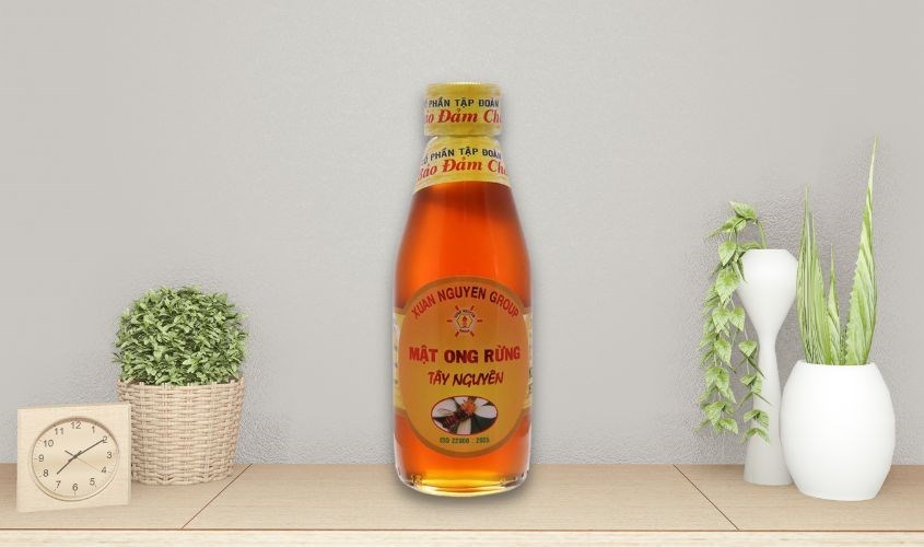 Mật ong rừng Tây Nguyên Xuân Nguyên chai 200 ml Mật ong rừng Tây Nguyên Xuân Nguyên chai 200 ml