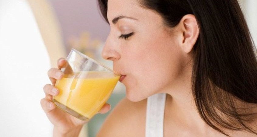 Có nên uống nước cam khi tập gym?