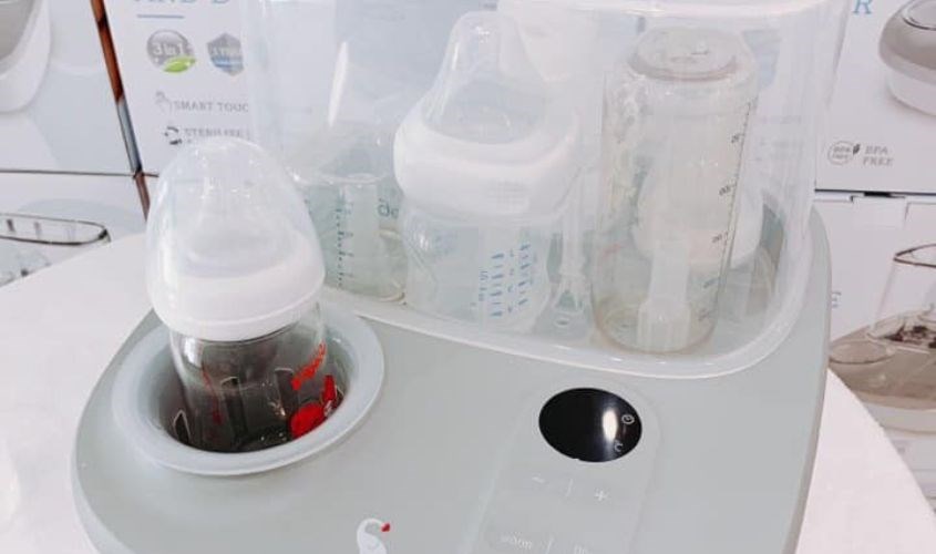 Chức năng hâm và rã đông ở khay hâm của máy