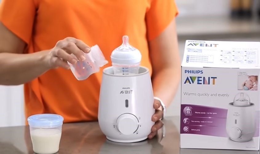 Cho nước khoáng vào máy hâm