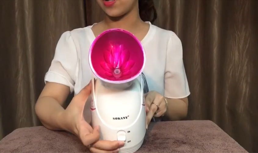 Gạt nút xuống để tắt máy