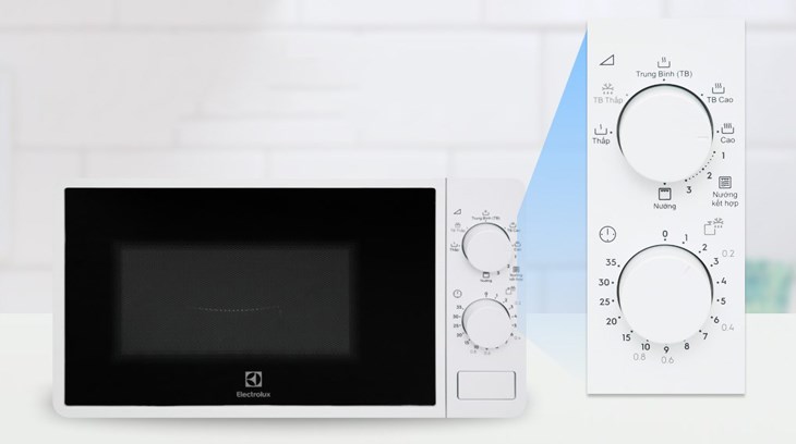 Xoay bảng điều khiển núm vặn trên lò vi sóng có nướng Electrolux EMG20K38GWP 20 lít để thiết lập hẹn giờ nấu và tiến hành các chương trình cài đặt