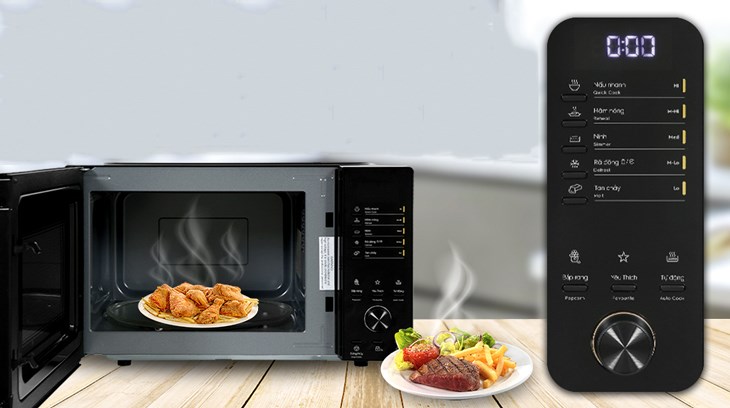 Xoay núm tròn của lò vi sóng Electrolux EMM23D22B 23 lít để chọn chức năng từ A-1 đến A-8