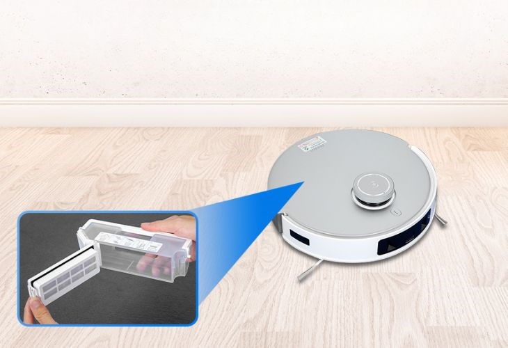 Tháo hộp đựng bụi của robot hút bụi lau nhà Ecovacs Deebot T20 Omni DLX23 giúp bảo vệ robot khỏi bụi bẩn trong quá trình thay pin