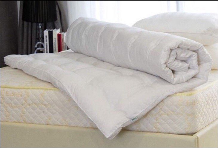 Roll up the mattress topper before storing in a dry, well-ventilated place