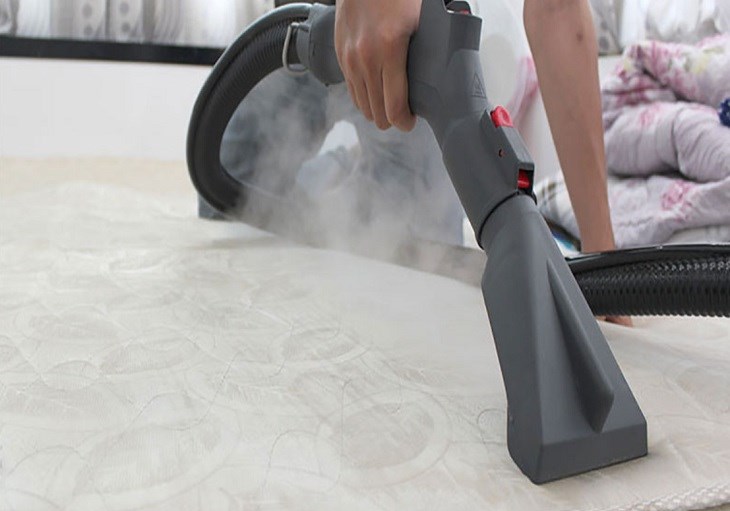 Vacuum the mattress topper with a vacuum cleaner