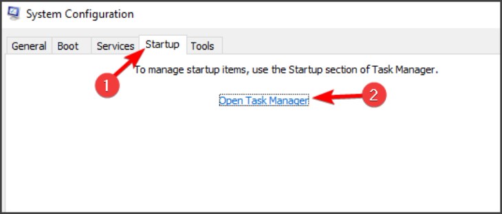Bạn hãy mở tab Startup > Nhấp vào mục Open Task Manager. 