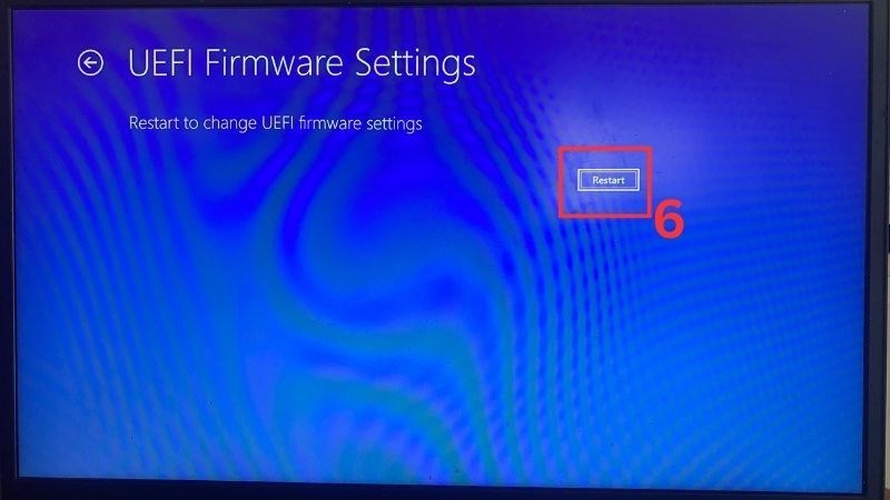 Tại UEFI Firmware Settings, bấm Restart