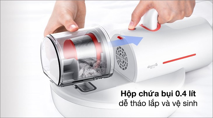 Nhấn vào khớp nối để mở hộp đựng bụi của máy hút bụi đệm giường Deerma CM1300 và lấy bụi ra ngoài