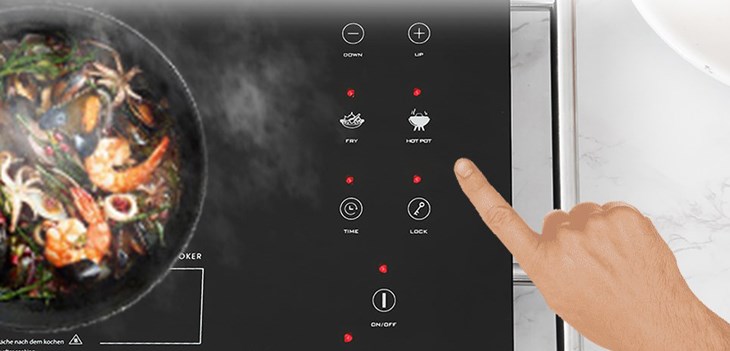 Giảm nhiệt độ bếp hồng ngoại Junger MT-21 về mức thấp nhất trước khi thay đổi nồi