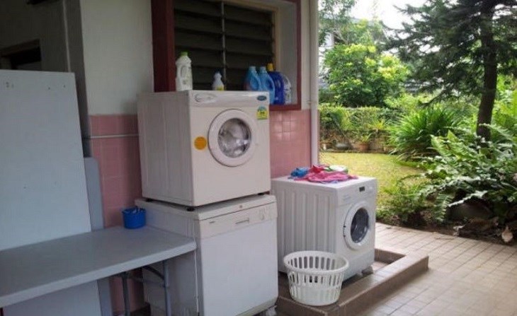 Place the washing machine in the clothes drying area