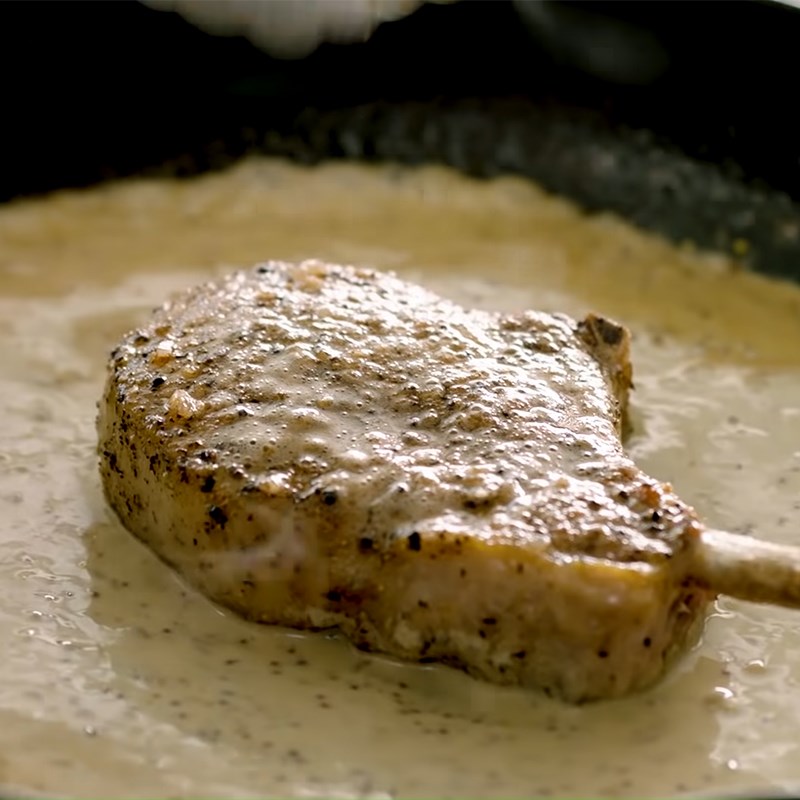 Step 4 Make sauce and braise the pork Seared pork chop with braised apples