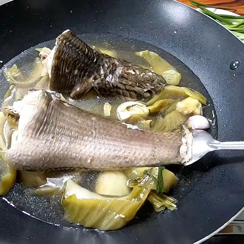 Bước 5 Nấu cá lóc với dưa cải Cá lóc hấp dưa cải (cải chua)