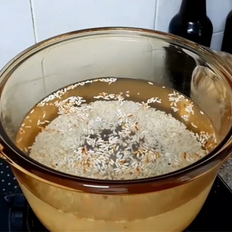 Bước 2 Rang và nấu gạo Cháo tôm hùm
