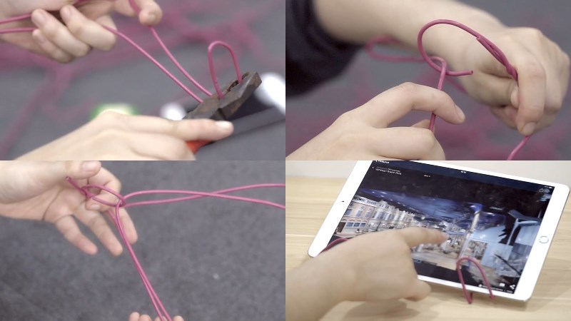 Dùng móc treo quần áo để làm giá đỡ máy tính bảng