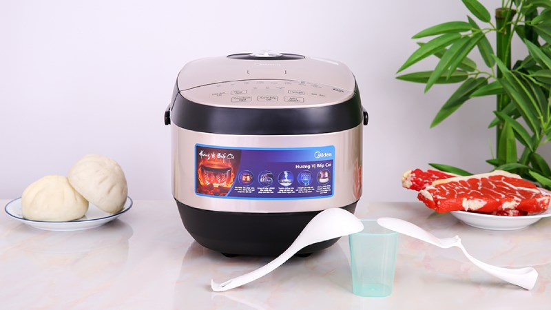 Nồi cơm điện tử Midea MB-FS5023 có màu vàng đồng