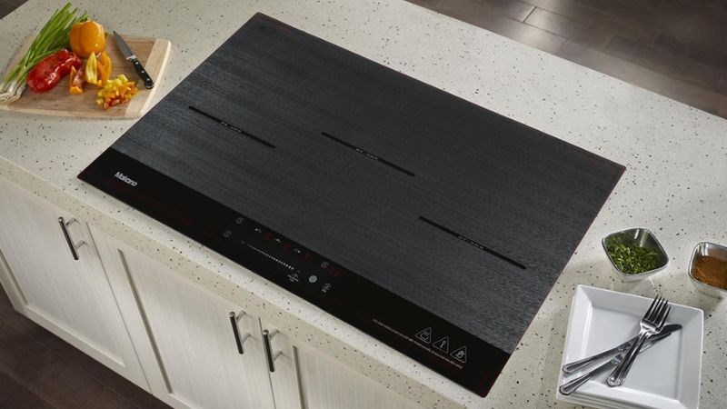 Bếp từ ba v&ugrave;ng nấu Makano MKT-300002