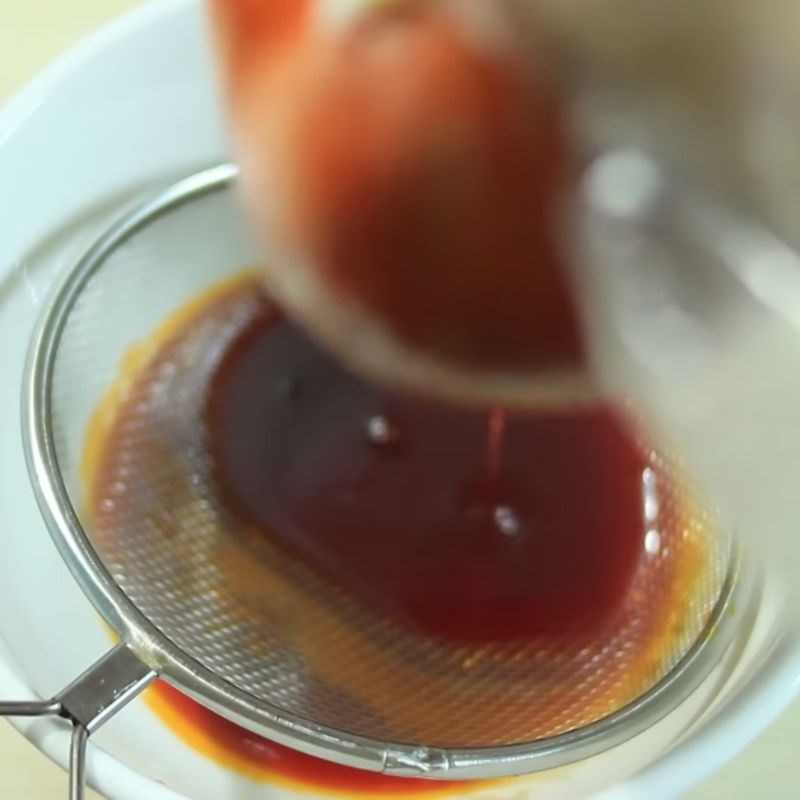 Bước 5 Lọc dầu gấc Dầu gấc