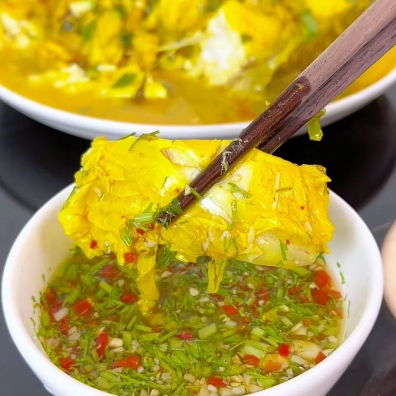 Bước 6 Thưởng thức Cá nấu mẻ nghệ