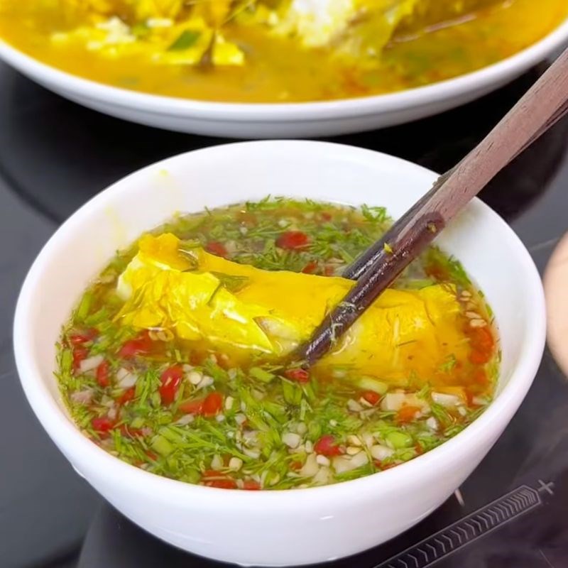 Bước 6 Thưởng thức Cá nấu mẻ nghệ