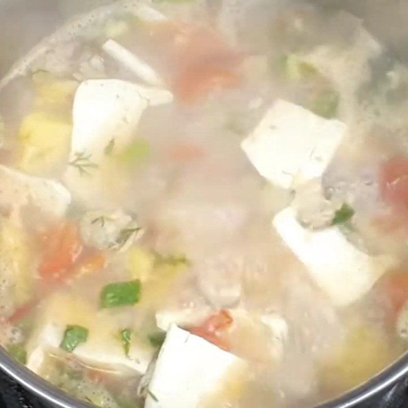 Bước 3 Nấu canh Canh ngao cà chua