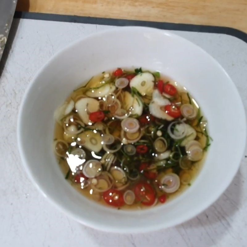 Bước 4 Pha nước chấm ốc vặn đậm đà Ốc vặn luộc